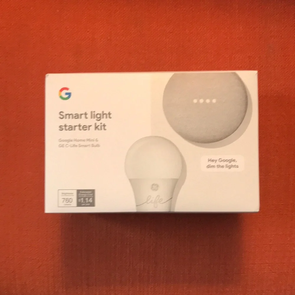 New in box Google Home Mini and Smart Lite Kit